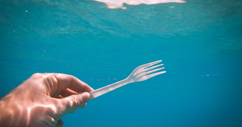 plastic fork under water, single-use plastic ban