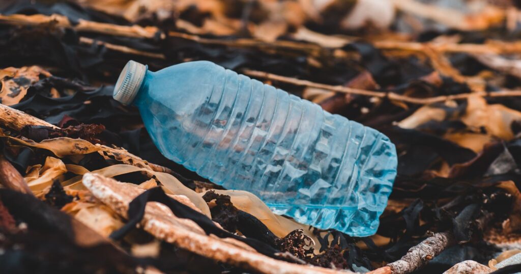 plastic water bottle on the beach