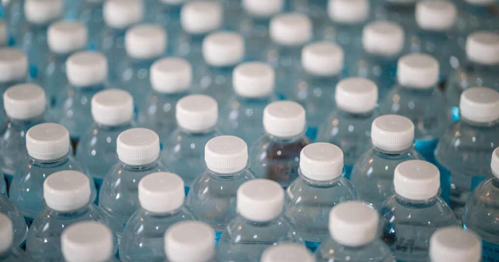 Rows of plastic bottles, single-use plastic ban