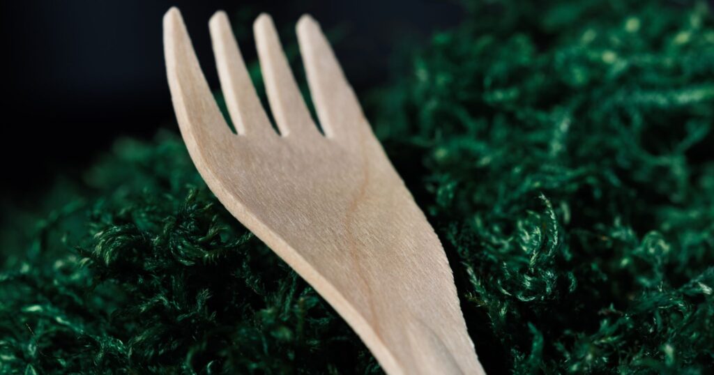 wood fork on a bed of green moss