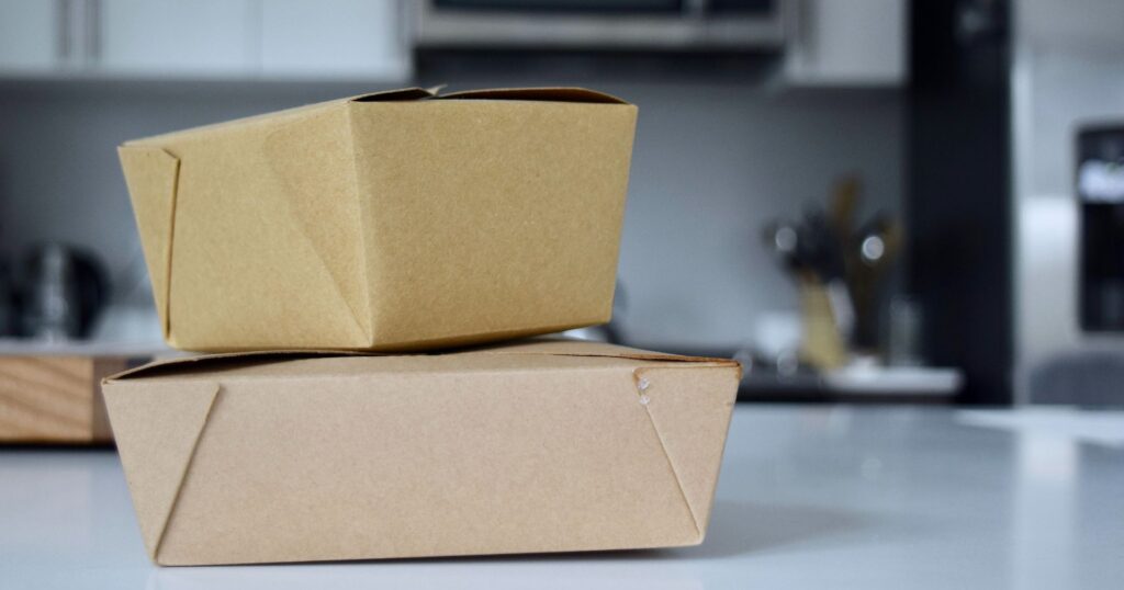 PFAS: cardboard food containers stacked on counter