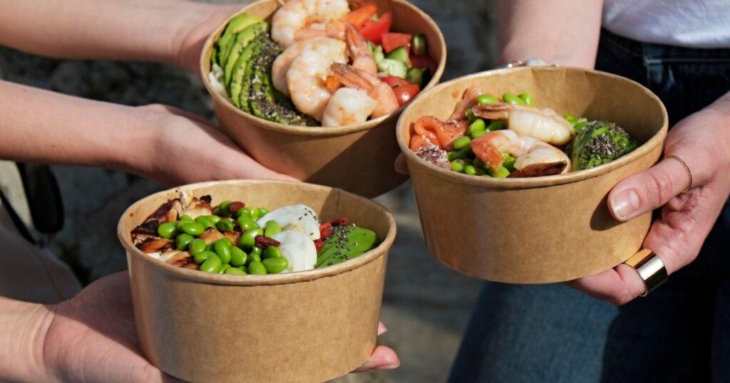 pla-lined takeout containers with poke inside