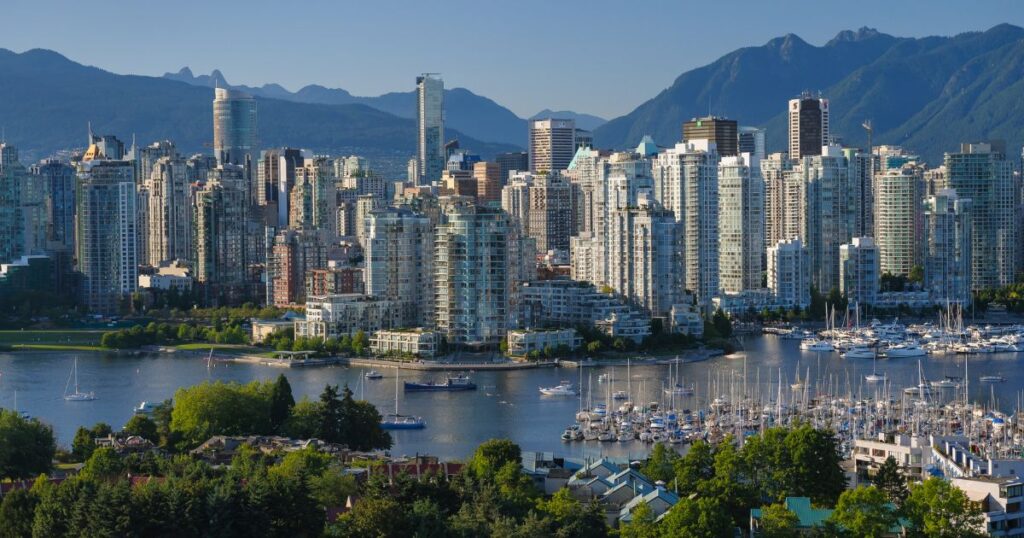 cityscape of Vancouver with mountains in the background, positive environmental news 2024