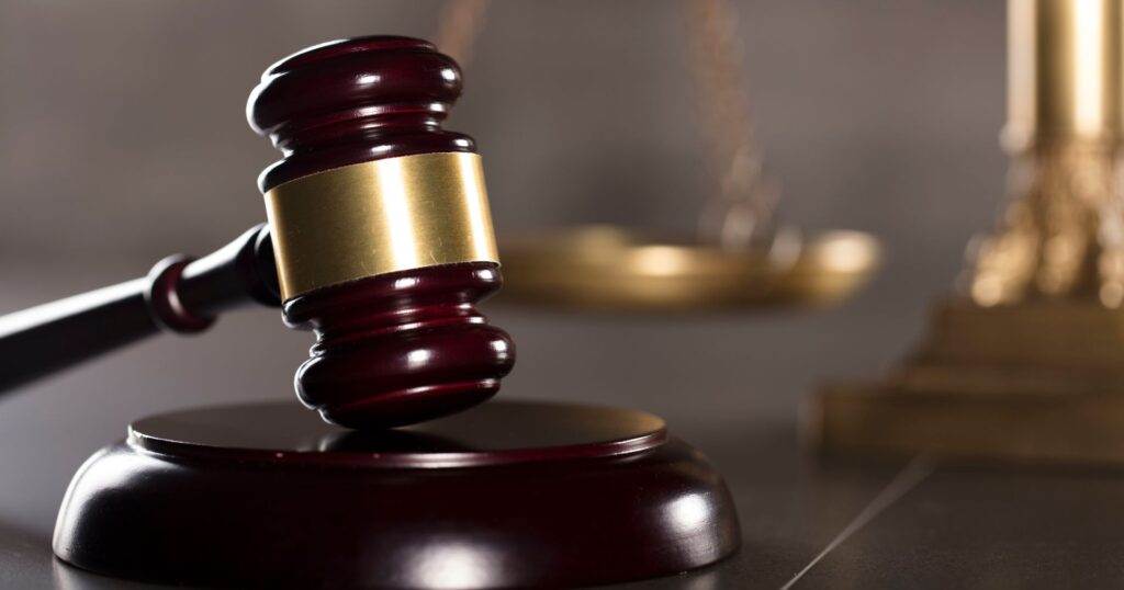 gavel with scale in the background, montreal plastic ban
